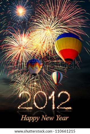 New year 2012. bright colorful fireworks and hot air-balloon of various colors in the night sky
