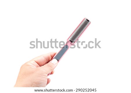Woman polishing fingernails with nail file, hands care