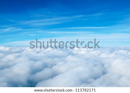 Clouds. View From The Window Of An Airplane Flying In The Clouds