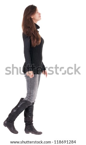 back view of walking  woman  in  black sweater. beautiful brunette girl in motion.  backside view of person.  Rear view people collection. Isolated over white background.