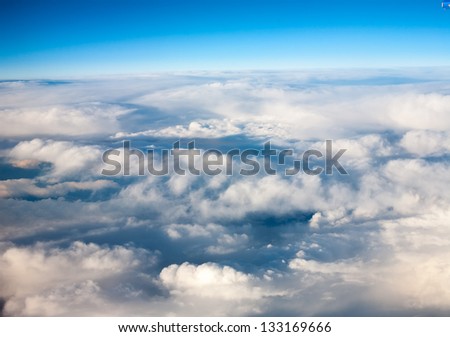 clouds. top view from  window of  airplane flying in  clouds. top view.