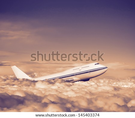 passenger airplane in the clouds. travel by air transport. flying to the top of the airliner. nobody