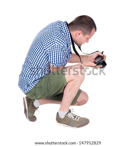 Back view of man photographing.  photographer in shorts. Rear view people collection.  backside view of person.  Isolated over white background.