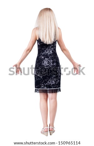 Back view of shocked woman in blue jeans. she spread her arms out to side. Rear view people collection.  backside view of person.  Isolated over white background.