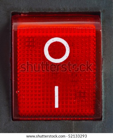 Close up of isolated red power on / off switch .