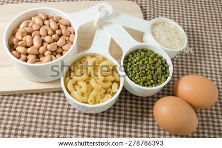 Food Ingredient, Pasta, Rice, Peanuts, Mung Beans and Egg High in Carbohydrate and Protein.