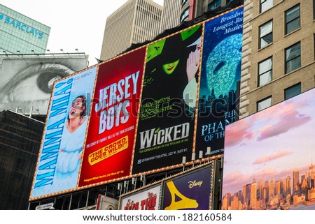 NYC, NEW YORK Ã¢Â?Â? CIRCA FEBRUARY 2014: Digital billboards showing advertisements for current theater plays in Times Square.