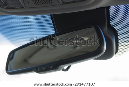 Black digital modern rear view mirror in the car