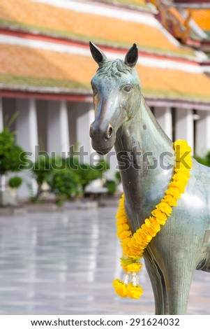 horse sculpture at Wat Suthat, a royal temple of first grade, one of ten such temples in Bangkok