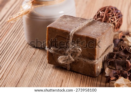 Spa and beauty. Soap and other spa items on wooden table