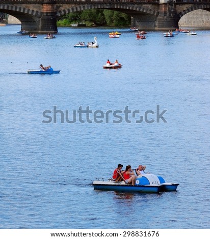 PRAGUE, CZECH REPUBLIC - JULY 21 2015: An Unidentified People on Boat on River
