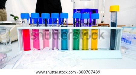 Stand with Test Tubes Filled with Colored Chemicals, Color Depends on pH of Chemical