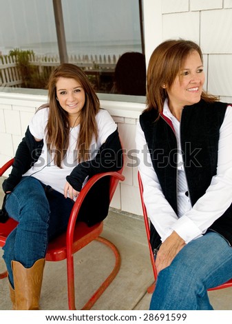 Mother and daughter enjoy their time together, focus is on the daughter