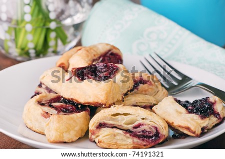 Plate of freshly baked berry pastries