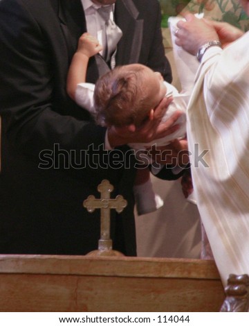 baby being baptized baby being baptized