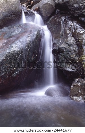 It is in a rill, a small waterfall.two big stones break the rill.  long exposure.