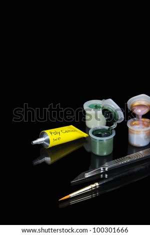 Model making equipment of acrylic paints, poly cement glue, craft knife and paint brush
