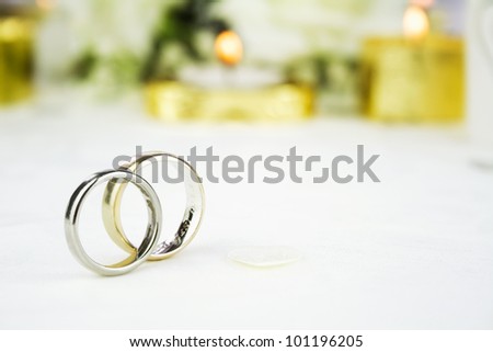 Bride and groom gold and white gold wedding rings