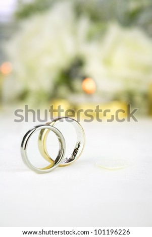 Bride and groom gold and white gold wedding rings