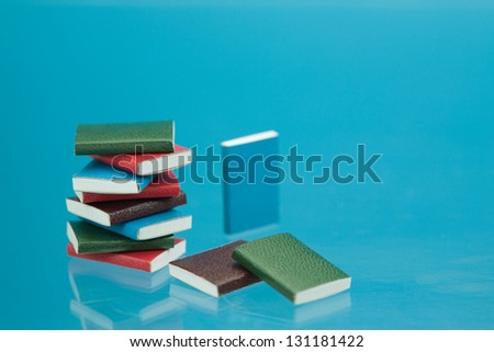 back to school concept with miniature school books