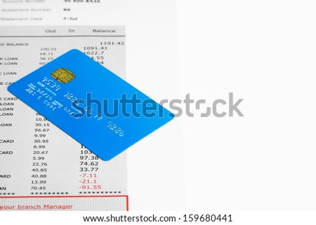 A Credit Card on top of a fake Bank Statements