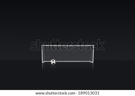 football goal with a black & white leather football in front