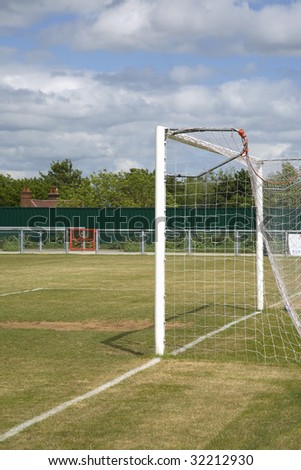 Semi Professional football ground with close up side view of goal posts
