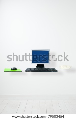 office concept, floating computer,mouse mat and telephone