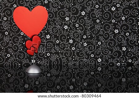 Blank Red Heart shape card with space for copy in the centre and held by a Love heart picture stand