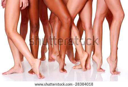 stock photo Beautiful female slim feet of group of girls isolated on a