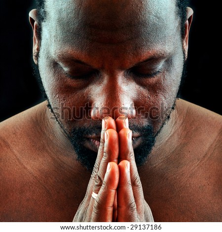 Portrait of the beautiful black man with an impressive skin, isolated on a black background