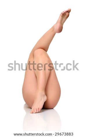 stock photo Beautiful feet of the young woman isolated on a white 