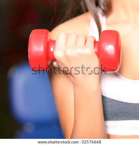 hand with dumbbells