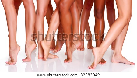 Beautiful female slim feet of group of girls, isolated on a white background, please see some of my other parts of a body images