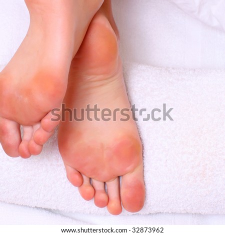 Well-groomed bared a foot of female feet