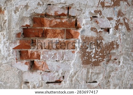 Broken brick wall. Background of old vintage dirty brick wall, texture.