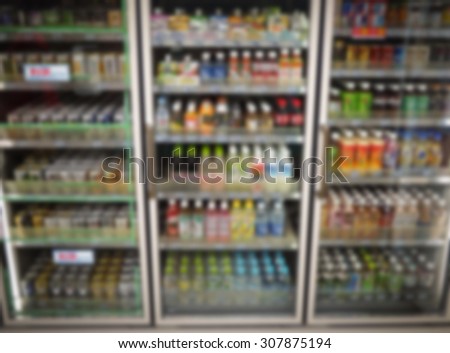 beverage on fridge shelves in a supermarket at japan on blur background