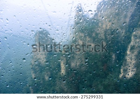 Water drops at the mirror with the mountain background