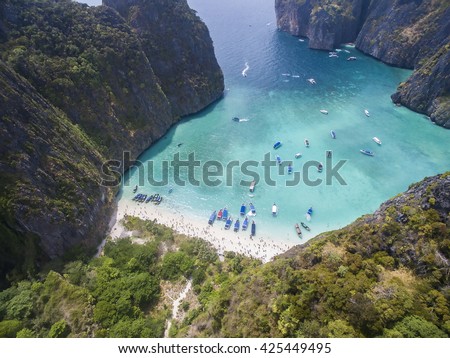 Beautiful hidden bay with white sands and clear blue water in tropical island. Maya Bay, Phi Phi Islands, Phi Phi Lei Island, Thailand