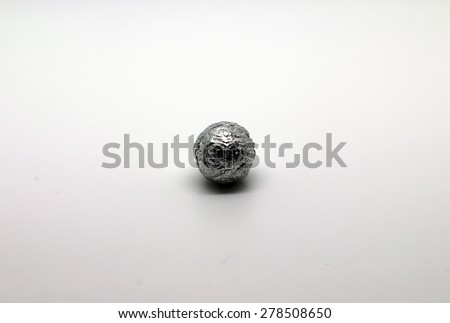 Silver sphere made from tin foil.