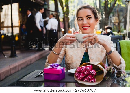 young stylish woman, fashion sunglasses, sitting in cafe, holding drinking cup cappuccino, tulips, happy birthday party, city street, boho outfit, europe vacation, romantic dinner, sunny, smiling