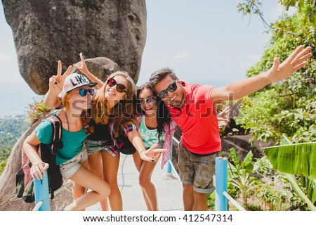 happy hipster company of friends traveling around world, sightseeing, cool outfit, colorful, crazy, having fun, laughing, smiling, tropical vacation in thailand, students, sunglasses, sunny, summer