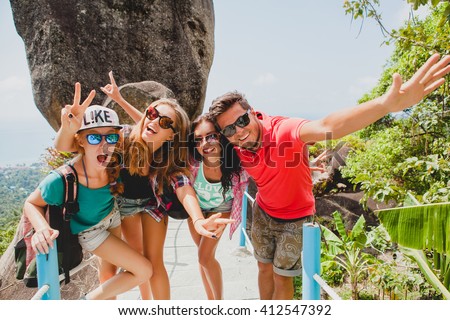 happy hipster company of friends traveling around world, sightseeing, cool outfit, colorful, crazy, having fun, laughing, smiling, tropical vacation in thailand, students, sunglasses, sunny, summer