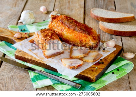 Sal, cured pork fat ,bacon on a wooden board. Traditional Ukrainian dish