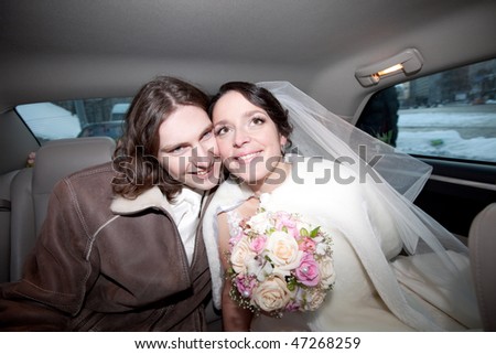 A couple in the car.Wedding