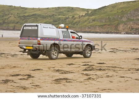 Four wheel drive vehicle patrolling the shoreline