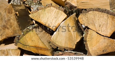 Close up of a log pile for background texture