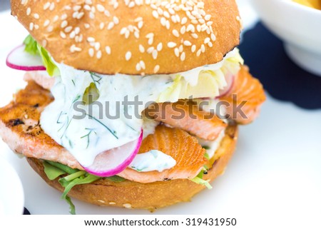 Tasty salmon fish burger