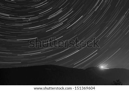 Night landscape in Donovaly resort, Slovakia, mountain the background of night sky with moving stars