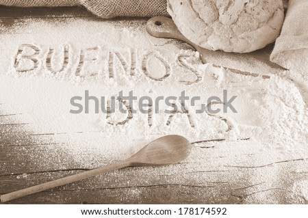 Flour on the table of the bakery with the phrase Good Morning.